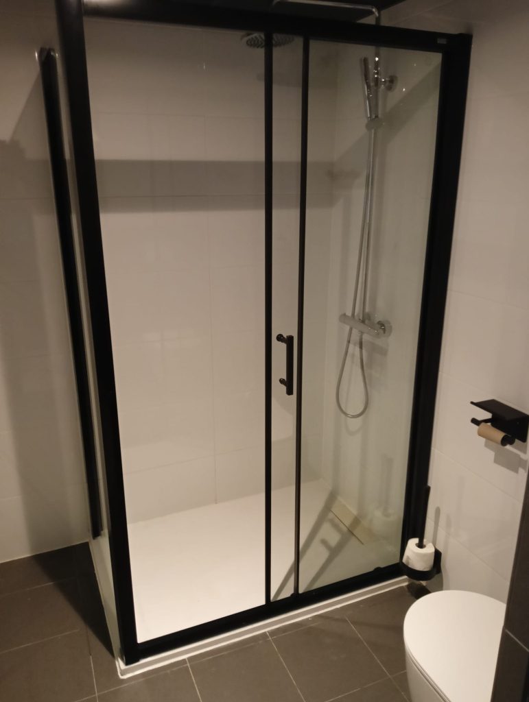 shower enclosure installed Homeservice Costa del Sol Installed shower wall by handyman on the Costa del Sol.